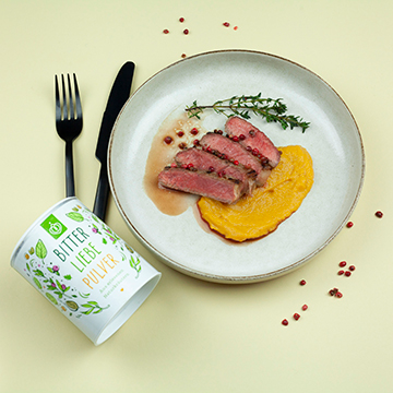 Rindersteak mit Rosa-Pfeffer-Butter und Süßkartoffelstampf